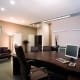Office cleaning in board room with high end furniture