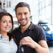 Car Dealership Cleaning Services In Kelowna - couple with car keys